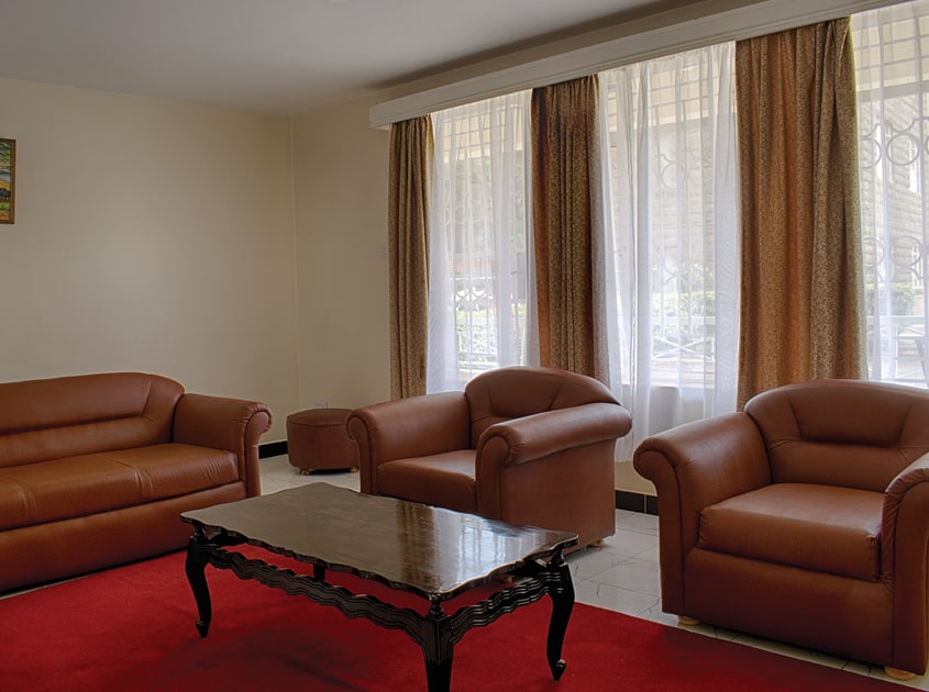 three-bedroom-apartment-living-room Three bedroom apartments 1